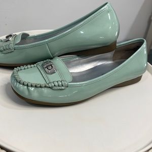 Patten leather loafers in a pastel green with metal lock detail lightly used